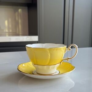 PARAGON Double Warrant Tea Cup and Saucer. Yellow Flower Petal with Gold Gilt.